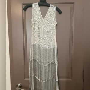 Gorgeous beaded white and silver dress. 1920s style.